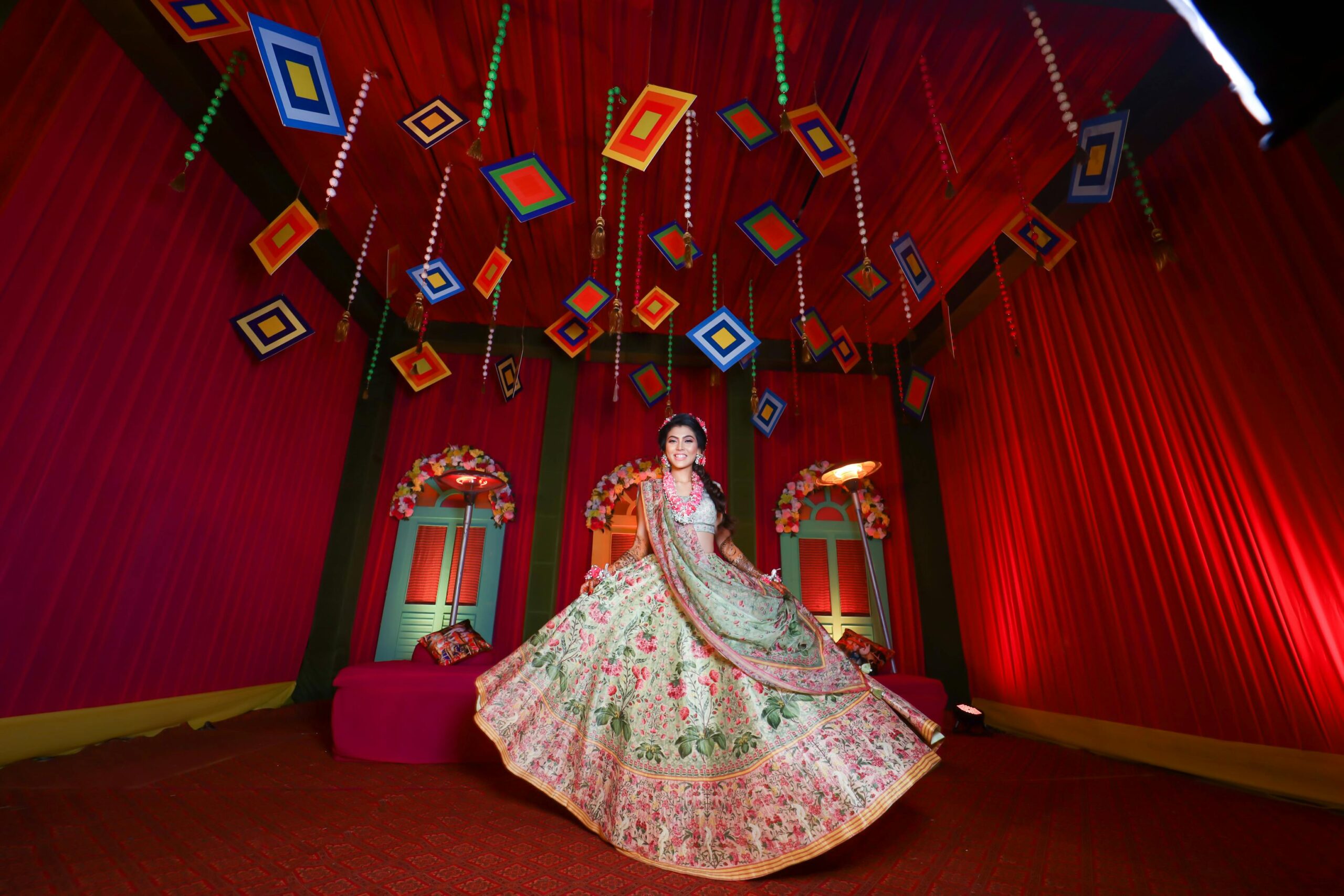 Beautiful Indian bride in a vibrant setting wearing a traditional wedding dress, celebrating culture and elegance.